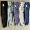 Calças masculinas moda casual de alta qualidade cp simples solto ao ar livre jogger esportes longos para jovens estudantes ropa hombre 231102
