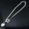 10 years factory wholesale stainless steel heart-shaped short necklace bracelet couples gifts with dust bags.