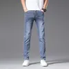 Calças de brim masculinas designer de luxo marca de moda jeans primavera nova elástica magro pé wear branco azul calças hxwj