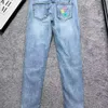 Jeans da uomo firmati Jeans con triangolo con alfabeto ricamato Pantaloni europei elasticizzati coreani da uomo slim-fit