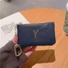 Diseñador Hombres Mujeres Monedero Moda Letras de lujo Cremallera de cuero Llavero Bolsa Mini Carteras Titulares de tarjetas