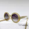 2023 designer de luxe 23 New Pearl Chain Glasses Pendant Round Lunettes de soleil Star Net Red Les mêmes lunettes de soleil 5489