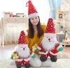 Kerstdecoraties 2 pc's/lot Santa Claus huidige poppen pluche voor huis Merry Xmas Jaar creatieve geschenken
