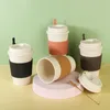 Tragbarer Kaffeebecher aus Weizenstroh, auslaufsicherer und verbrühungssicherer Milchbecher. Isolierter begleitender Wasserbecher für Studentenbüros im Freien
