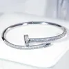 Bracciale in oro Braccialetti per unghie firmati per donne e uomini Donna Mosang Diamond Versione coreana Nuovo stile Incolore Alla moda Personalizzato Logo completamente esplosivo