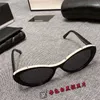 Designer maschi e femminili occhiali da sole per coppia da uomo 20% sconto su INS Fashion Oval Net Red Letter CH5416