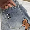 Jeans pour hommes Designer jeans pour hommes alphabet brodé dessin animé chaton jean coréen slim-fit pied élastique mode pantalon européen NEBD 846X