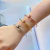 Bracciale in oro Braccialetti per unghie firmati per donne e uomini Donna Mosang Diamond Versione coreana Nuovo stile Incolore Alla moda Personalizzato Logo completamente esplosivo