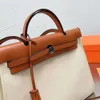 Luxuriöse Designer-Schultertaschen für Damen, große Kapazität, Pendlerklasse, Einkaufstasche, Canvas, College-Stil, einfarbig, Handtasche, Geldbörsen mit Schlössern