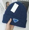 Luxury Brimless Hat Designer Mężczyźni i kobiety Projekt mody Zimny ​​kapelusz Autumn Wool Hatter List Jacquard Neutral Warm Hatbeanie