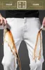Mäns jeans designer lyx 2023 Tre bevistyg, oljebeständiga, vattentäta och bakterieresistenta vita löst passande jeans för män iz1y