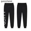 2023SS Męskie spodnie jesień mężczyźni odzież sportowa Casual Tracksuit Fashion Mash Mandpants Spodnie Black White Designer Jogger Mens Pants