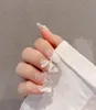 Oval French Fake Nails Long Press på 3D Bow Tie Falska naglar med mönster Rund akrylvitt lim på för kvinnor och flickor3376548