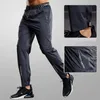 Outdoor Pants Pantalon de sport à séchage rapide pantalon de course pour hommes poches zippées entraînement jogging pantalon de sport fitness pantalon de sport décontracté 231103