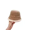 Sombreros de ala ancha Sombreros de pescador Diseñador Otoño Invierno Nuevo Tejido de lana sólida Sombrero de pescador minimalista y versátil Lujo ligero Sensación de alto grado Sombrero de cubo Lindo