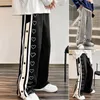 Pantaloni da uomo Hip Hop Petto da pallacanestro Fresco spacco laterale Pantaloni sportivi a strisce lunghe con lacci a vita media da skateboard