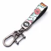 Keychains Car Door Lock Keychain Simple Strong Carabiner Buckle Graffiti Condole Belt Key Chain Ring Detachable Keyring Holder