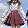 Юбки модные летние женщины мини -юбки в стиле Япония плиссированная юбка для девочек высокая талия клетчатка милые женские ученики юбки 230403