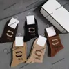 Trendy sokken herfst en winter nieuwe lange gouden zijde letter high-end mode geschenkdoos veelzijdige halflange lengte voor dames