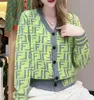 Kobiet luksusowy swetra w V-de-de-de-de-de-de-de-desnewki płaszcze gliny wysokiej jakości wysokiej jakości geometryczne wzory kontrastowe kolor lwów dzianinowe swetry na zewnątrz streetwear na zewnątrz