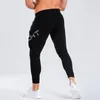 Pantaloni da uomo Palestre Pantaloni sportivi neri Pantaloni da jogging Pantaloni skinny da uomo Pantaloni casual da uomo Fitness Allenamento Pista in cotone Autunno Inverno Abbigliamento sportivoMen's Heat22