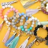 Regalos de fiesta Mujeres Chica Llavero Correa para la muñeca Borla de madera Grano Encanto Pulsera Cadena Llavero Pulseras de cuentas de silicona de calidad alimentaria