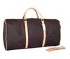 Skórzany torba Duffel Designer męskie worki na noc brązowy kwiat duża pojemność designerskie torby torebki damskie noszenie na woreczka podróżnicza weekend