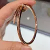 Brand Luksusowy 18 -karatowy Złota Bransoletka Projektant paznokci Bangles dla kobiet i mężczyzn Fine Edition Elastic Gruste Rose Rose Half Diamond Non Small Logo