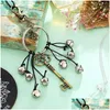 Objets décoratifs Figurines Sorcière Wind Bells Room Decor Car Bell Pendant Magic Key For Door Protection Dhr3O