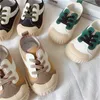 Atletische outdoor cozulma kinderen canvas schoenen jongens meisjes zachte zool schoenen 1-6 jaar peuter kinderen platte sneakers baby ademende sportschoenen 21-32 w0329