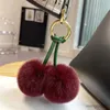 Keychains Lanyards Cute Cherry Real Fur Keychain Plush Ball Women Bag Charm Jewelry Pendant Car Key Metal Ring Girl Toy Gift R231103