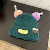 Ugly funny cartoon sausage mouth wool hat designer brand men and women's autumn and winter warm cute big head around cashmere knitted ear protection hat tide AAAAAAA