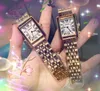 Haut de gamme cool amateurs réservoir romain deux broches design montre or rose boîtier en argent hommes femmes ultra mince horloge en acier inoxydable bracelet en cuir véritable visage carré montres à quartz