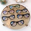 2023 Nya lyxdesigner Solglasögon Cat's Eye Art Plate Black kan matchas med olika grader Plain Glazed Glases Frame CH3405