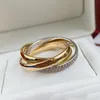 Carter Trinity Ring Charms için Kadın Tasarımcı Çift Boyut 678 MAN DIAMAS TRICYCLLIC Crossover T0P Kalite Altın Kaplama 18K Resmi Reprodications Yıldönümü