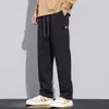 Herrbyxor män kläder raka rörbyxor koreanska mode höst trend löst passande bred ben joggar man avslappnad taktisk