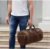 Duffel Bags Avrupa ve Amerika Birleşik Devletleri Vintage Erkekler Taşınabilir Seyahat Çantası Deri Büyük Kapasite Kovası Çok Fonksiyonel