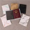 Porte-cartes mode femmes hommes couverture de passeport en cuir Pu marbre Style voyage porte-carte d'identité paquet portefeuille sac à main sacs pochette