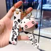 Portachiavi di mucche in silicone per cartoni animati Creativo simpatico animale Mucca da latte Ciondolo Portachiavi per auto Accessori per borse Gioielli Regalo di Natale