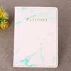 Porte-cartes mode femmes hommes couverture de passeport en cuir Pu marbre Style voyage porte-carte d'identité paquet portefeuille sac à main sacs pochette
