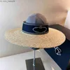 Designer Stingy Brim Hats Spring and Summer New Ribbon Letter Big Eaves Wheat STACH SUN Outdoor Tourism Beach Sunshade Protection tom Top T2304031