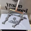 Desginer Viviene Westwoods Imperatriz Viúva Xi Novos Brincos de Osso Cheio de Diamante de Três Seções Personalizados Punk Sweet Cool Dog Bone Splice Brincos Alta Edição