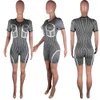 Bulk grossistkvinnor en bit rompers designer blixtlås upp randtryck korta sommar jumpsuits outfits kvinnor bodycon playsuits 9643