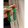 Girocollo Corpo in vetro naturale che riflette la luce Calcedonio verde Collana corta con catena a tre strati con clavicola Retro per regalare alla mamma un ornamento