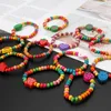 Braccialetti con ciondoli 12 pezzi Decorazioni elasticizzate per bambine in legno colorato D5QB