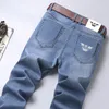 Jeans masculinos primavera verão fino denim fino ajuste europeu americano high-end marca pequena calças retas XL872-3