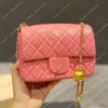 Borsa firmata a quadri Nove colori Pallina dorata Classica pelle trapuntata con diamanti 2024ss Hardware Tracolla a catena con patta intrecciata Mini borsa a tracolla da donna di lusso