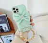 Luxurys Defingers Case Iphone Fashion 13 Case Mobile Phone 12117 مع Bow Stereo Camera Protemonnaie 12Pro
