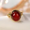 Anillos de racimo Plata de ley 925 Chapado en oro Anillo de sangre de ámbar natural Personalidad Ahueca hacia fuera Fideos de huevo Abierto para mujer