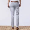 Męskie dżinsy wiosenne lato cienki dżins Slim Fit European American High-end marka małe proste spodnie XL891-2